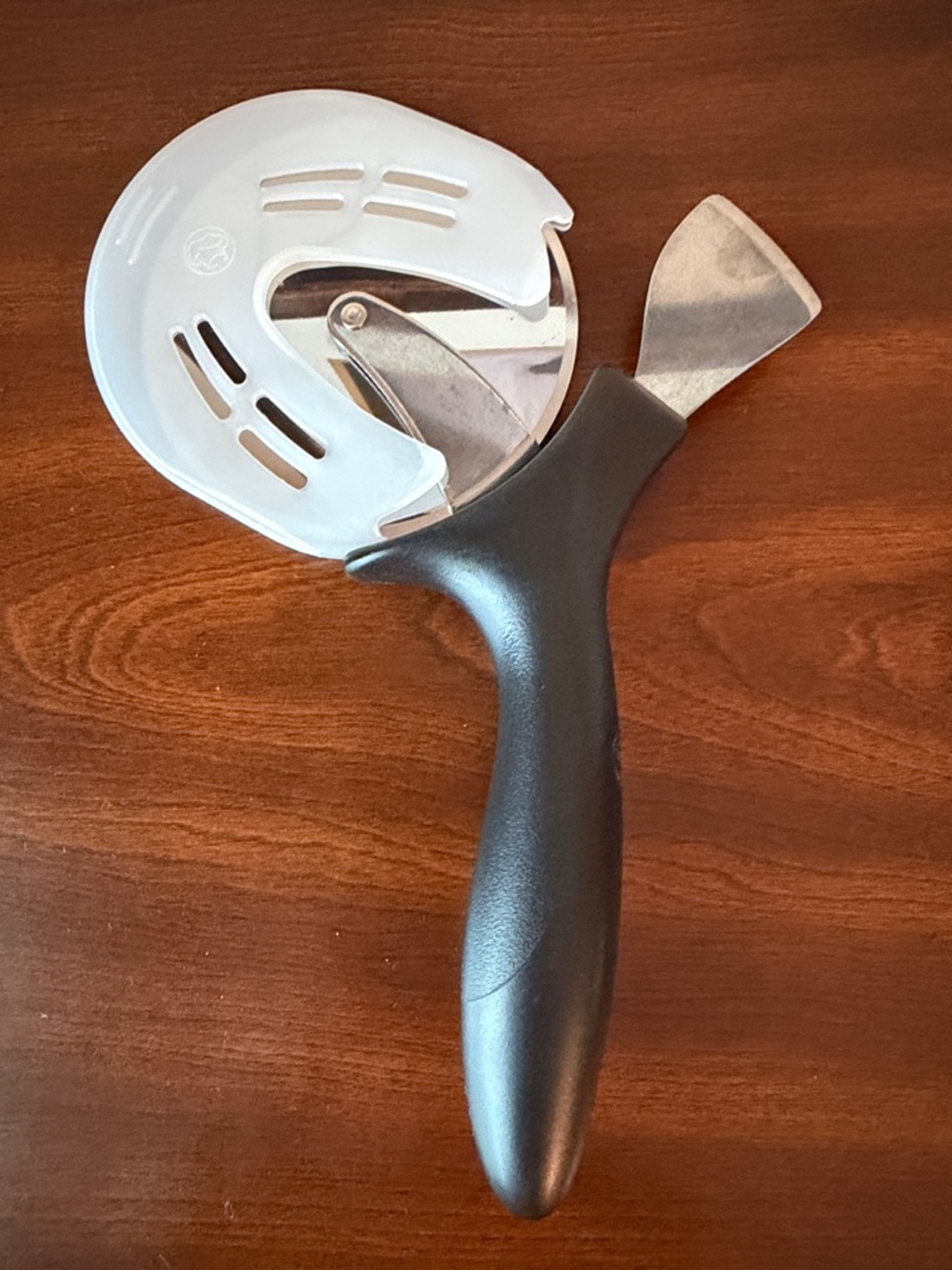 Pampered Chef Black & Silver Handheld Pizza Cutter with Safety Guard